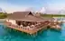 Relaxed overwater resort perfect for dining in Maldives, blending tradition with stunning seascapes.