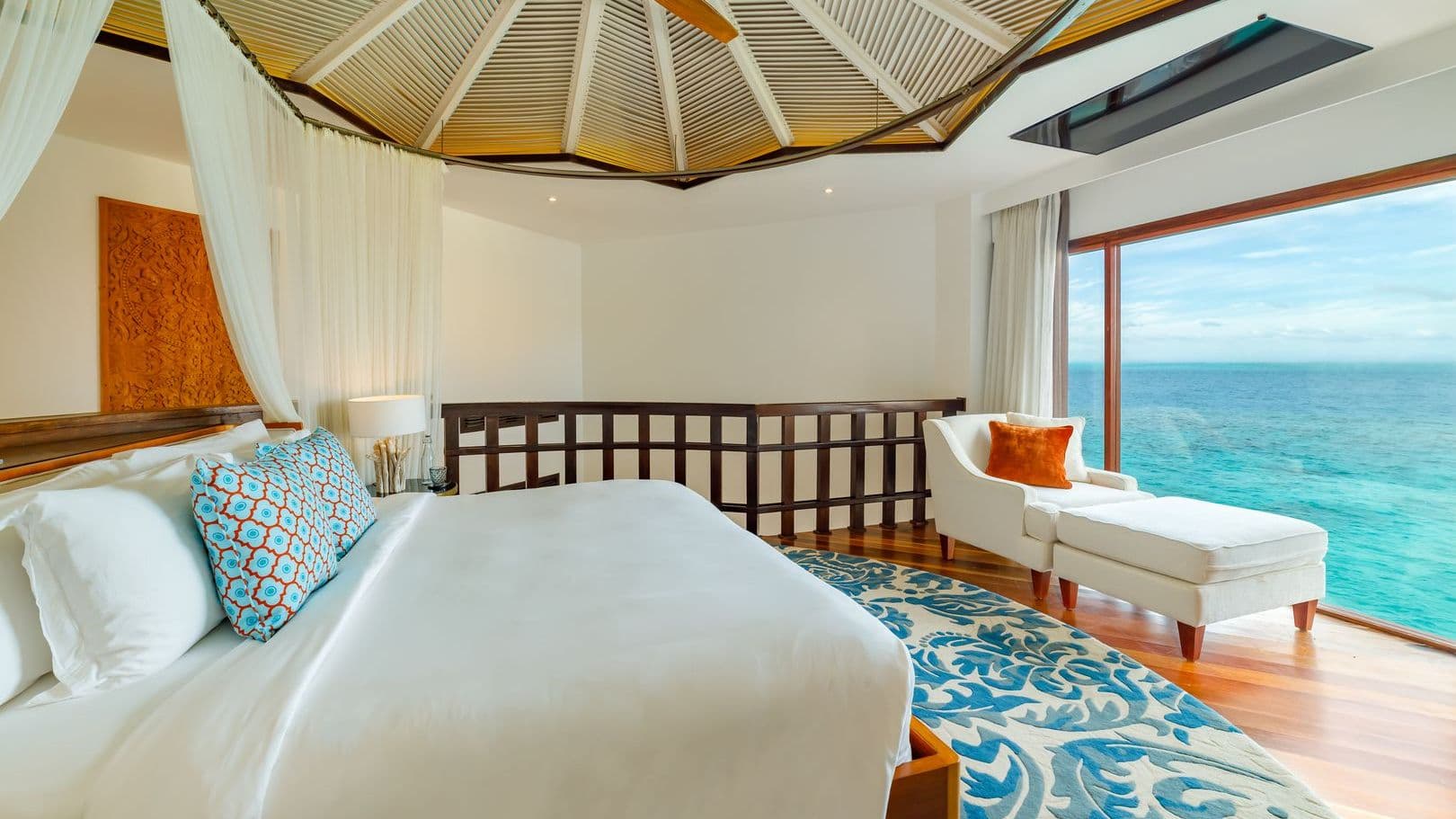 Overwater bungalows on tranquil waters at a Maldives resort on water, offering serene escape.