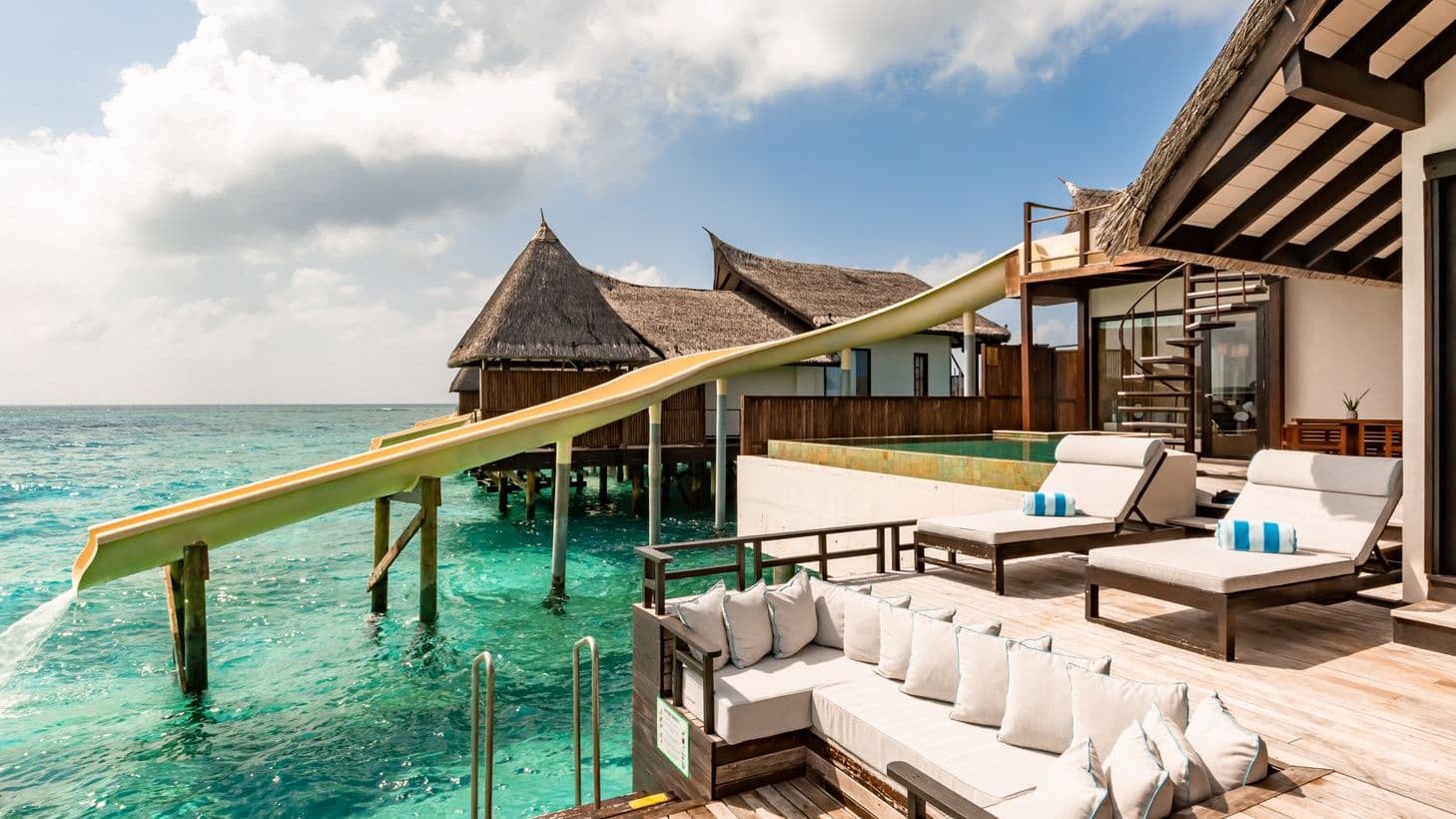 Vibrant water slide at a luxurious resort, perfect for fun.