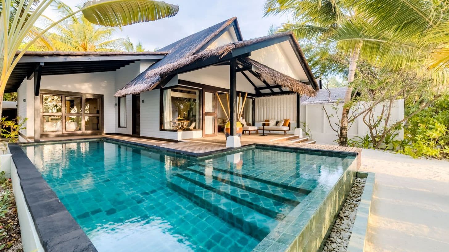 Private villa experience in the Maldives with a luxury villa setting.